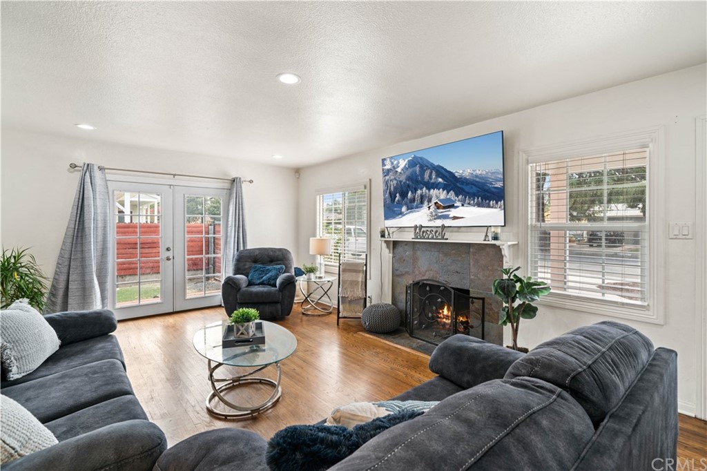 4909 El Molino Avenue Riverside, CA 92504 - Photo 4 of 33 a living room with furniture and a fireplace