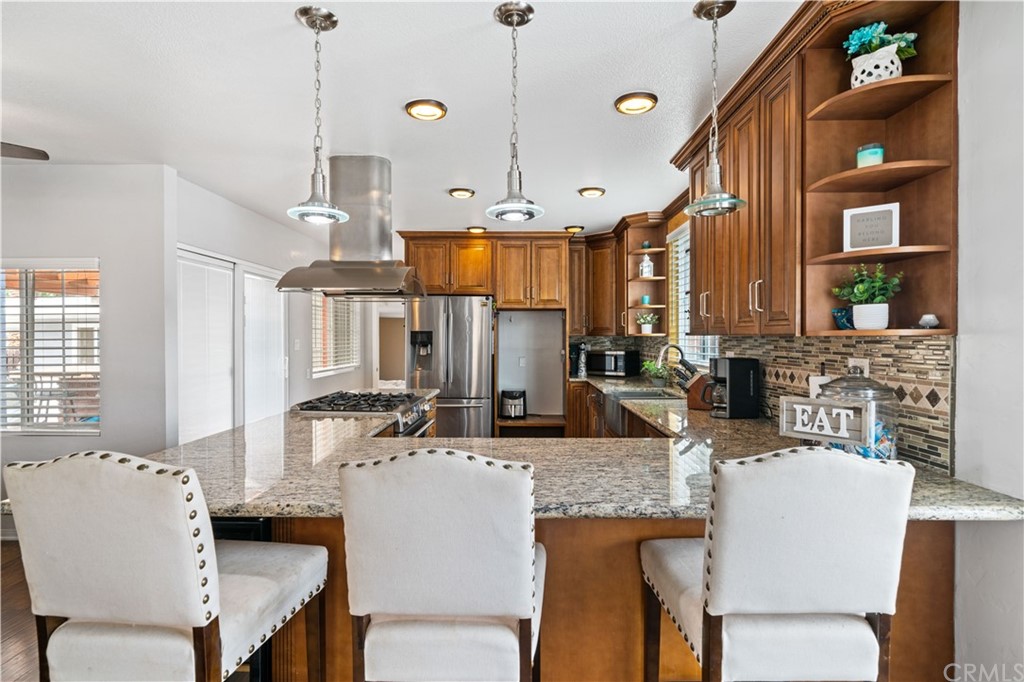 4909 El Molino Avenue Riverside, CA 92504 - Photo 6 of 33 a view of a dining room with furniture