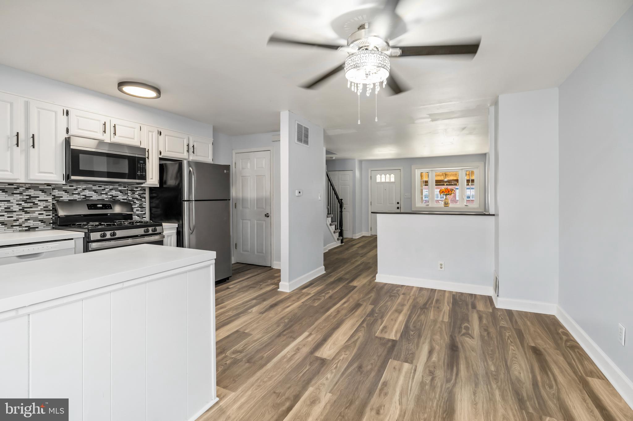 8136 Mid Haven Road Dundalk, MD 21222 - Photo 11 of 29 Dining Area with Chandelier Fan