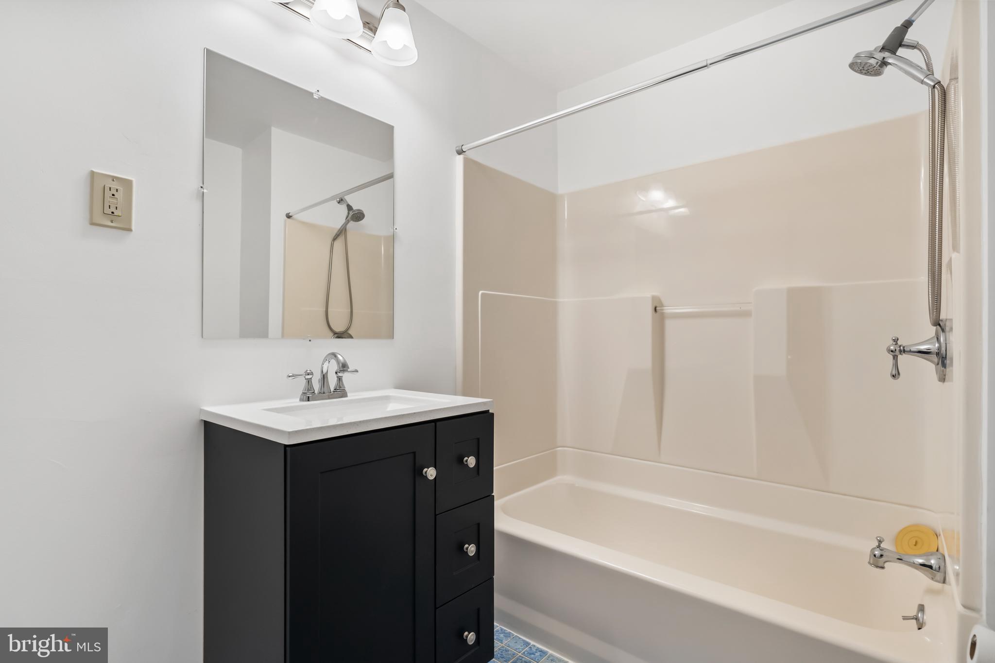 8136 Mid Haven Road Dundalk, MD 21222 - Photo 20 of 29 Ensuite Bath with Tub & Shower