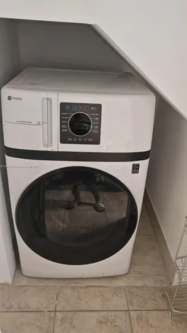a utility room with a washer and dryer