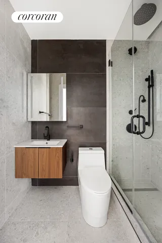 a bedroom with a large bed and a potted plant