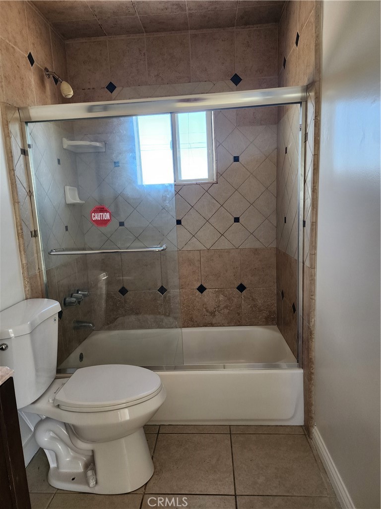 38850 Carolside Avenue Palmdale, CA 93550 - Photo 9 of 10 a bathroom with a toilet and a shower