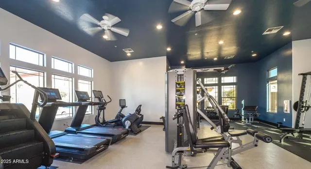 a view of a swimming pool in a backyard