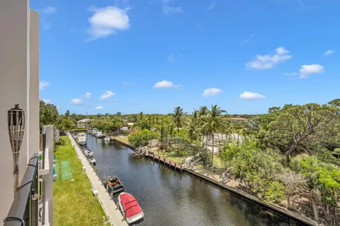 a view of swimming pool from a balcony