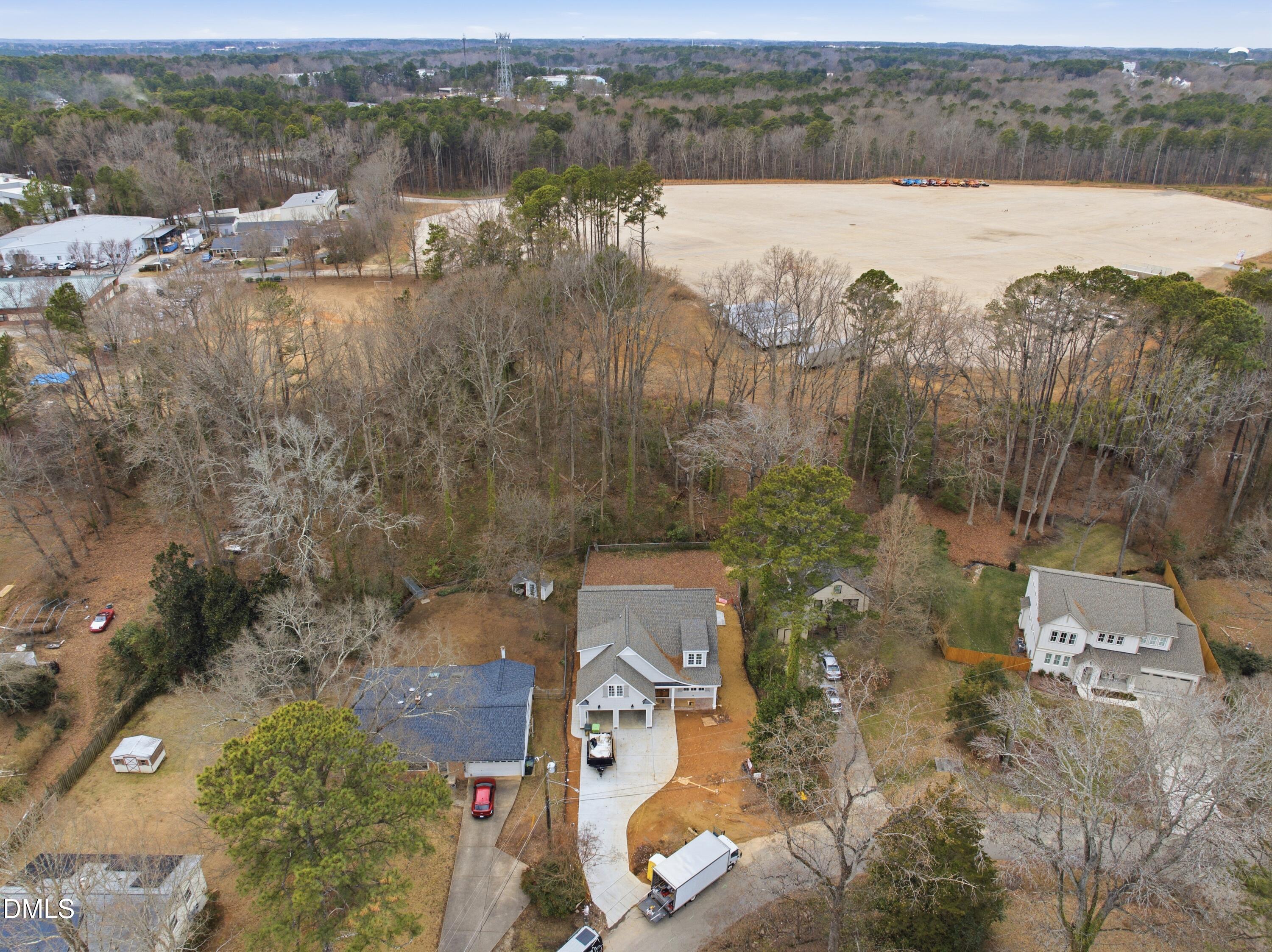 305 Gary Street Raleigh, NC 27606 - Photo 42 of 53 an aerial view of a house with a lake view