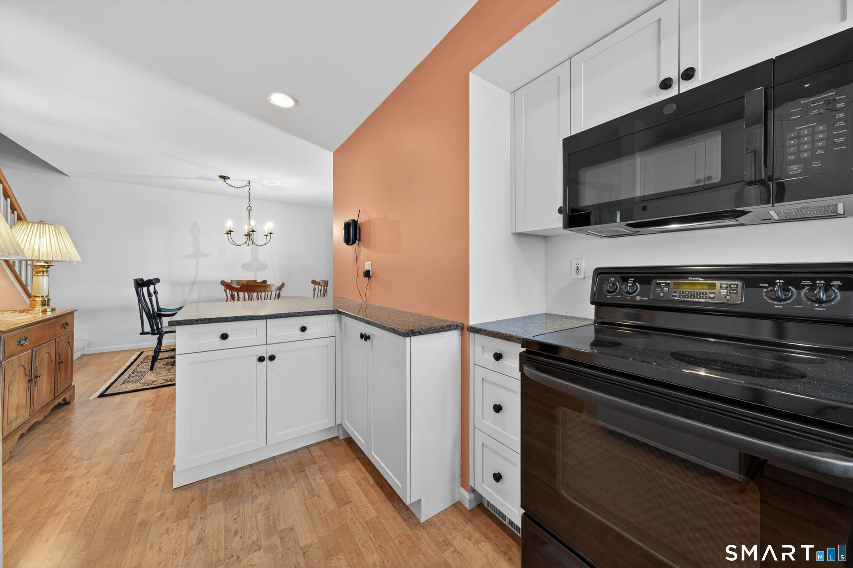 65 Forest Road, Unit D Milford, CT 06461 - Photo 13 of 39 Updated kitchen with breakfast bar.