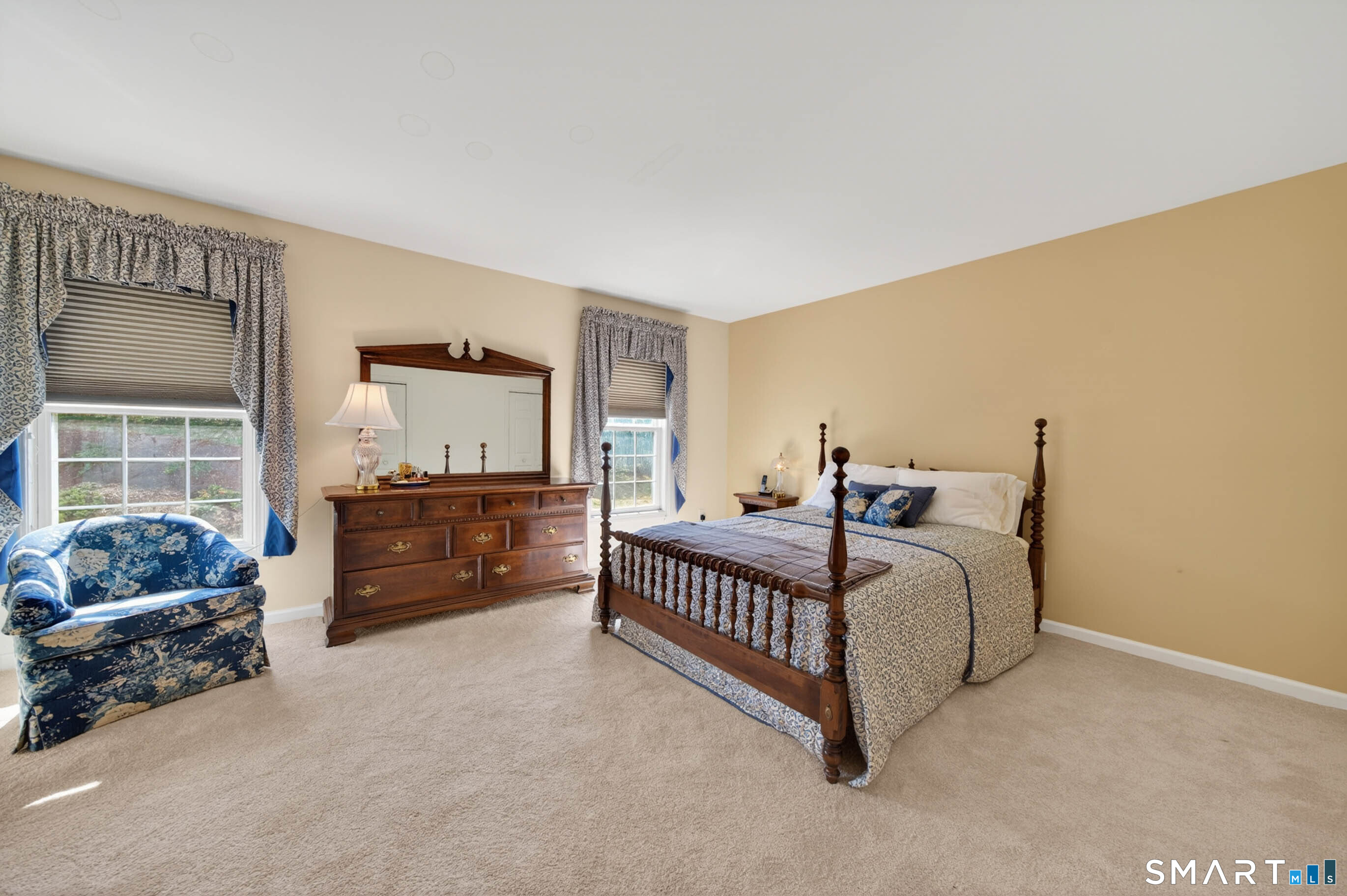 65 Forest Road, Unit D Milford, CT 06461 - Photo 16 of 39 The first floor primary bedroom.