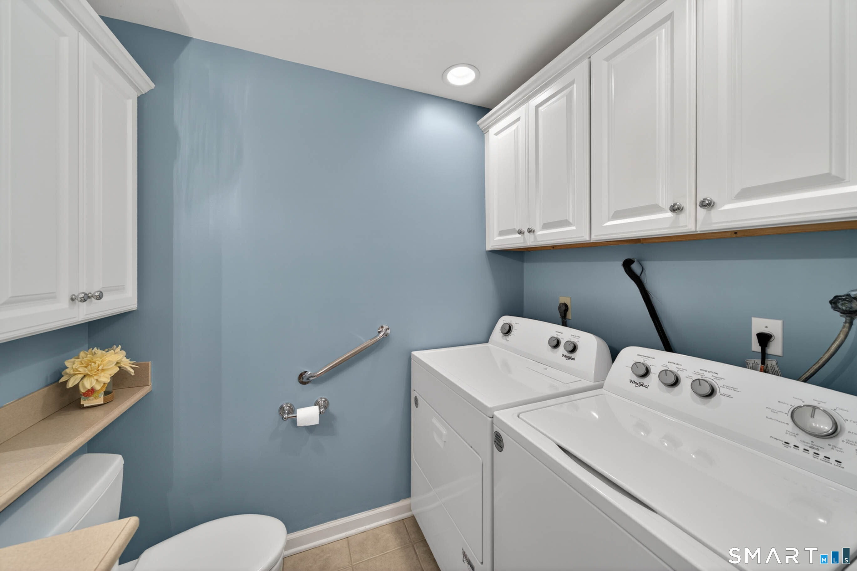 65 Forest Road, Unit D Milford, CT 06461 - Photo 21 of 39 First floor laundry with full size washer & dryer, and ample storage.