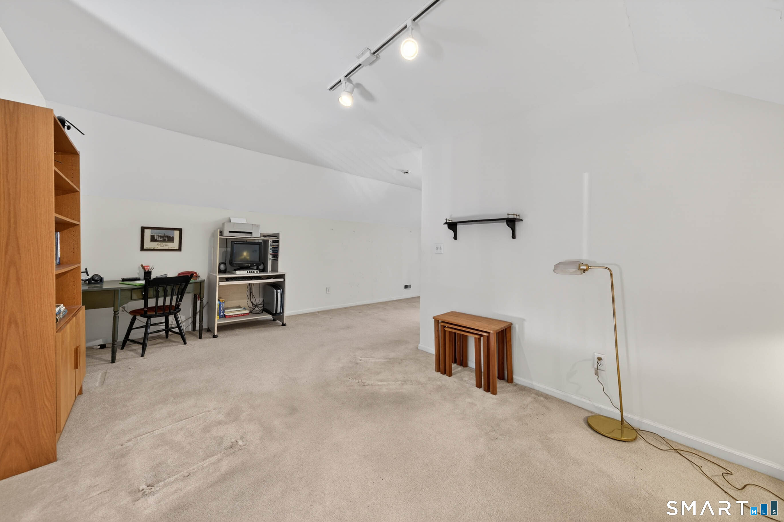 65 Forest Road, Unit D Milford, CT 06461 - Photo 23 of 39 Spacious and airy loft area overlooking the living room. Perfect as an office, exercise area or den.