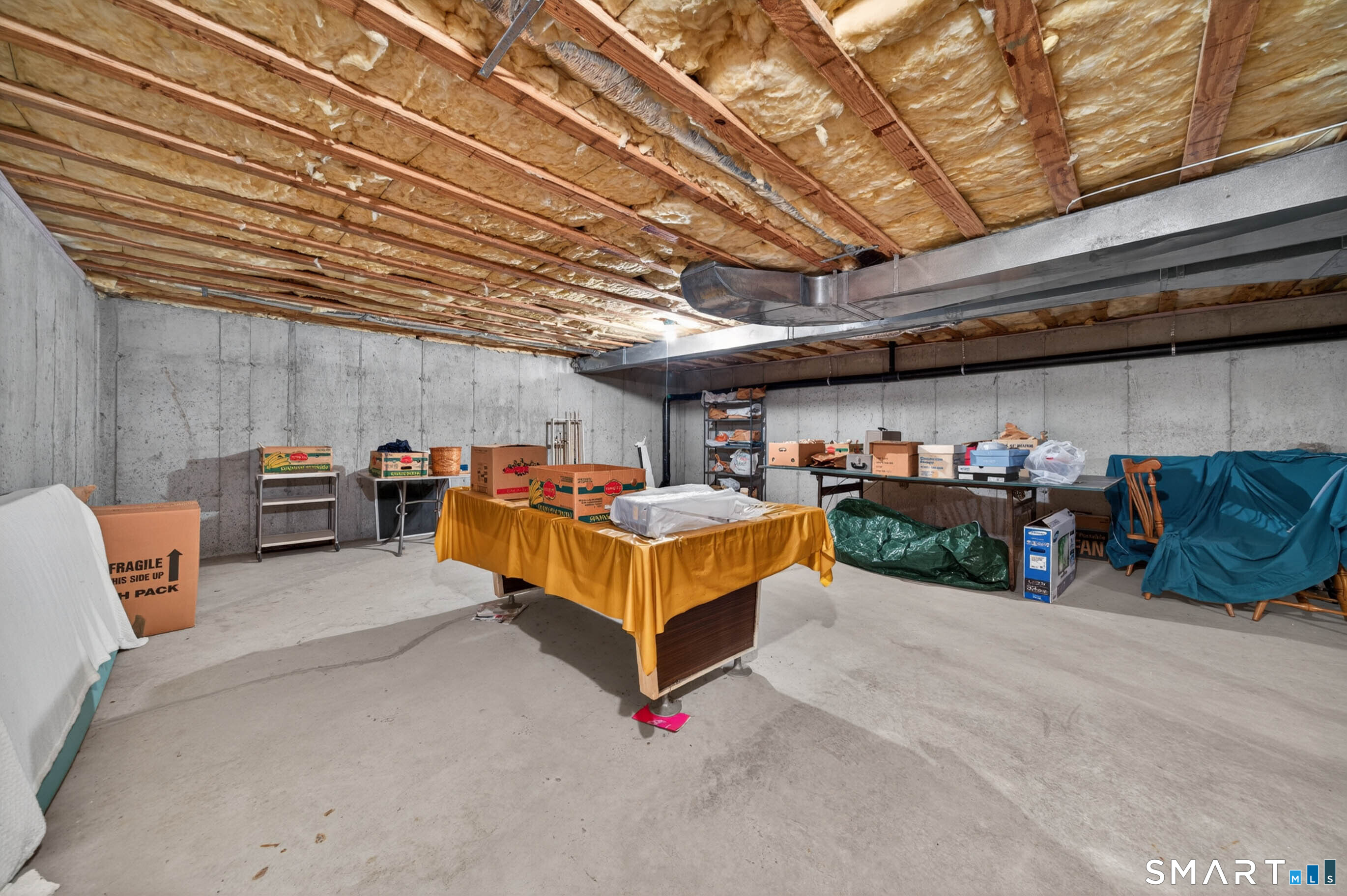 65 Forest Road, Unit D Milford, CT 06461 - Photo 29 of 39 The basement adds an additional 1000 sq. ft. to the home. Perfect for storage or to finish.