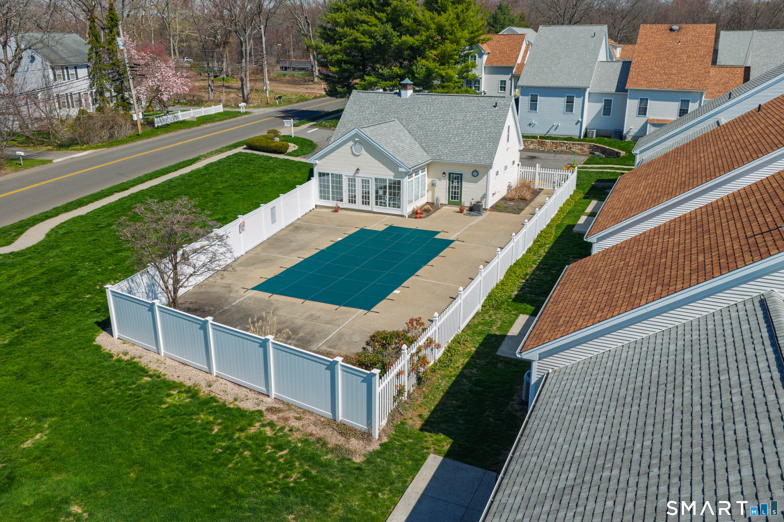 65 Forest Road, Unit D Milford, CT 06461 - Photo 35 of 39 Aerial view of the association pool and clubhouse.