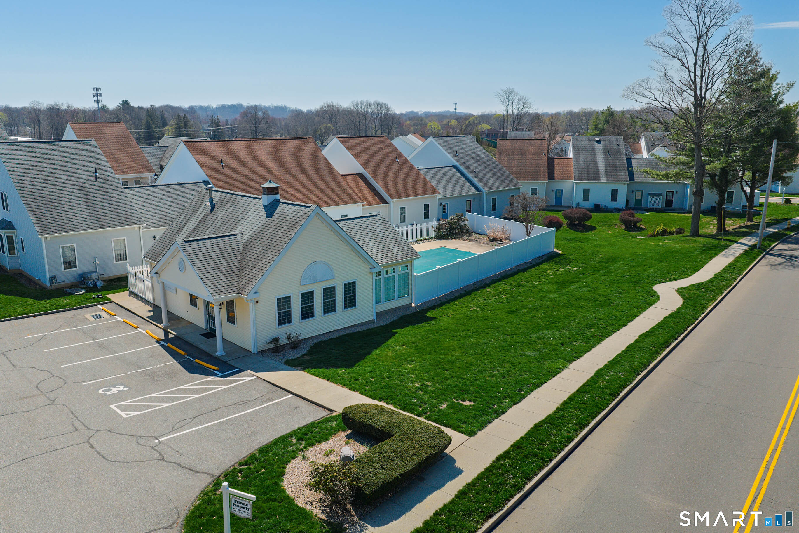 65 Forest Road, Unit D Milford, CT 06461 - Photo 36 of 39 Aerial view of the association pool and clubhouse.