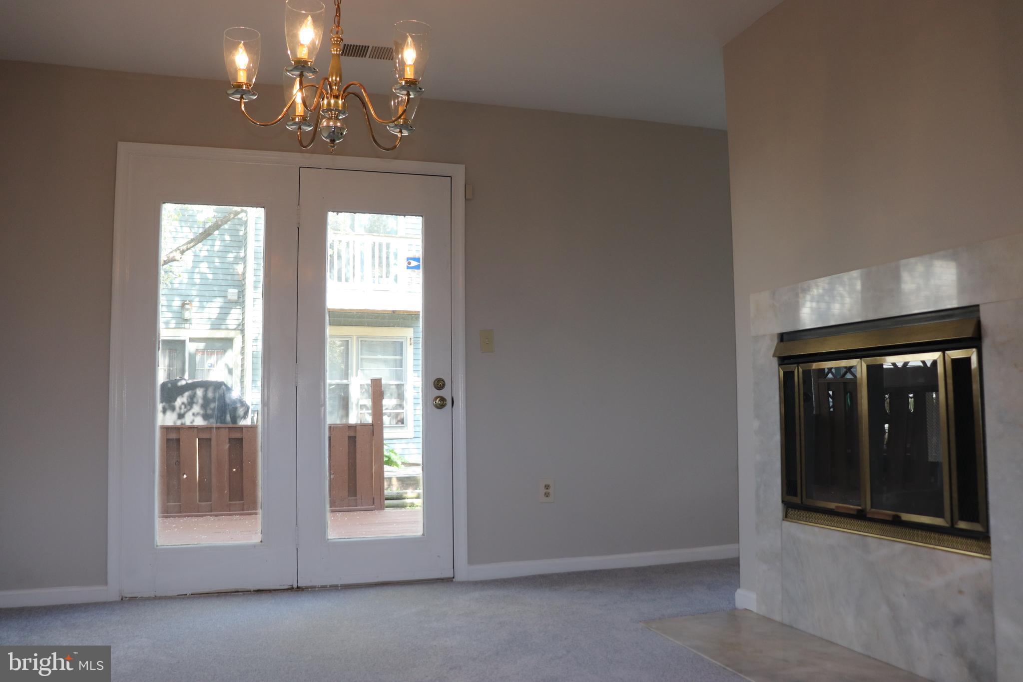 9324 Player Drive, Unit 124 Laurel, MD 20708 - Photo 18 of 34 Dining Area overlooking deck