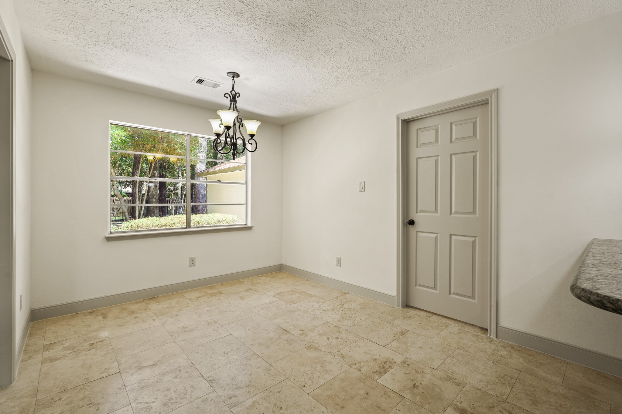 17606 Rustington Drive Spring, TX 77379 - Photo 13 of 44 a view of an empty room with a window