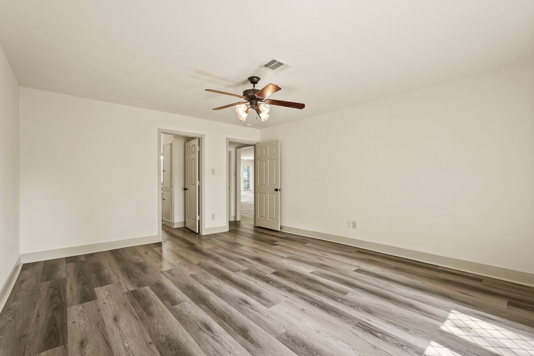 17606 Rustington Drive Spring, TX 77379 - Photo 25 of 44 wooden floor in an empty room