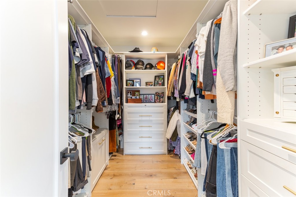 620 Gary Place Newport Beach, CA 92663 - Photo 23 of 36 a view of walk in closet with clothes