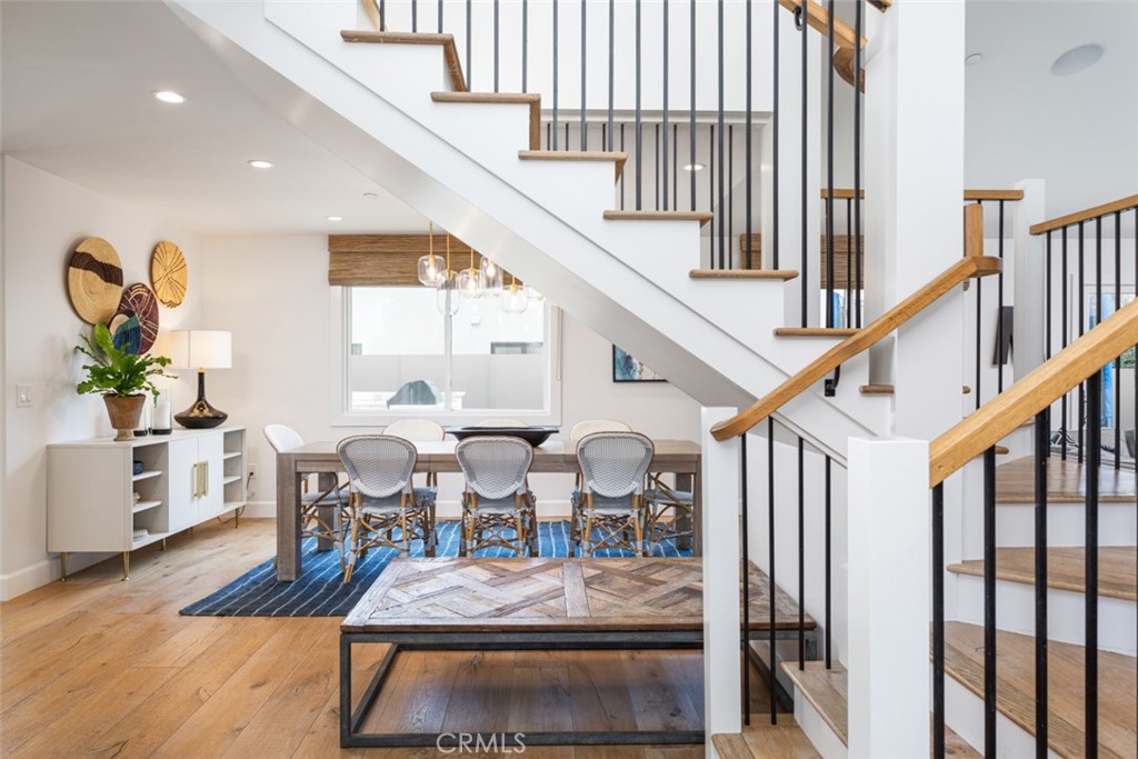 620 Gary Place Newport Beach, CA 92663 - Photo 4 of 36 a view of entryway dining room and hall with wooden floor