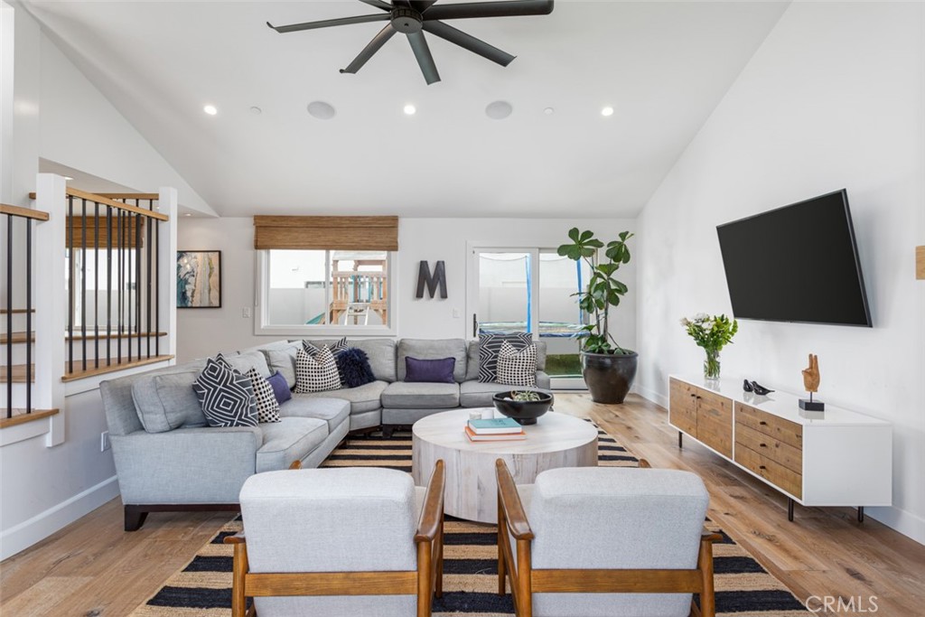 620 Gary Place Newport Beach, CA 92663 - Photo 5 of 36 a living room with furniture and a flat screen tv