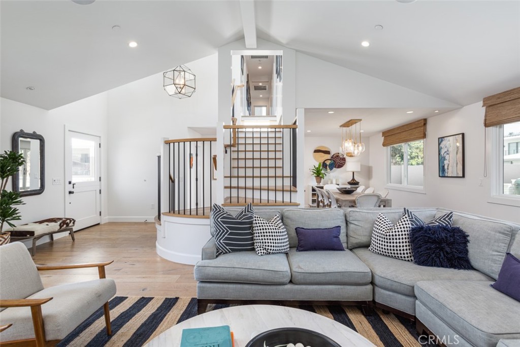 620 Gary Place Newport Beach, CA 92663 - Photo 8 of 36 a living room with furniture or couch and a dresser