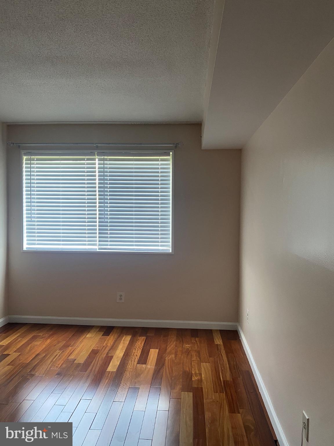 1836 Metzerott Road, Unit 707 Hyattsville, MD 20783 - Photo 8 of 13 Bright and airy room with hardwood floors.