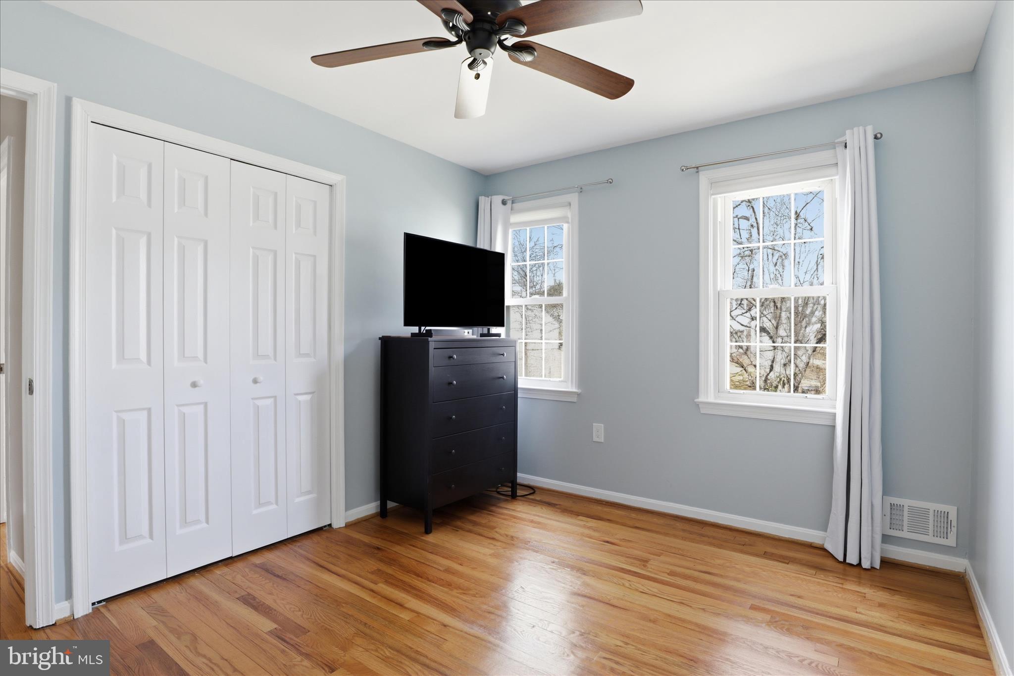 1600 Billman Lane Silver Spring, MD 20902 - Photo 19 of 41 a view of an empty room with wooden floor and a window