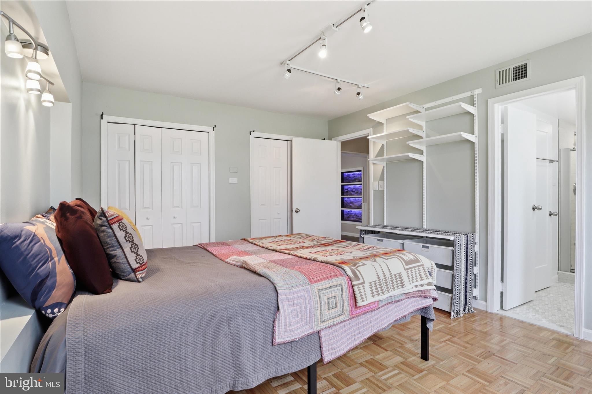 1600 Billman Lane Silver Spring, MD 20902 - Photo 22 of 41 a bedroom with a bed and a table