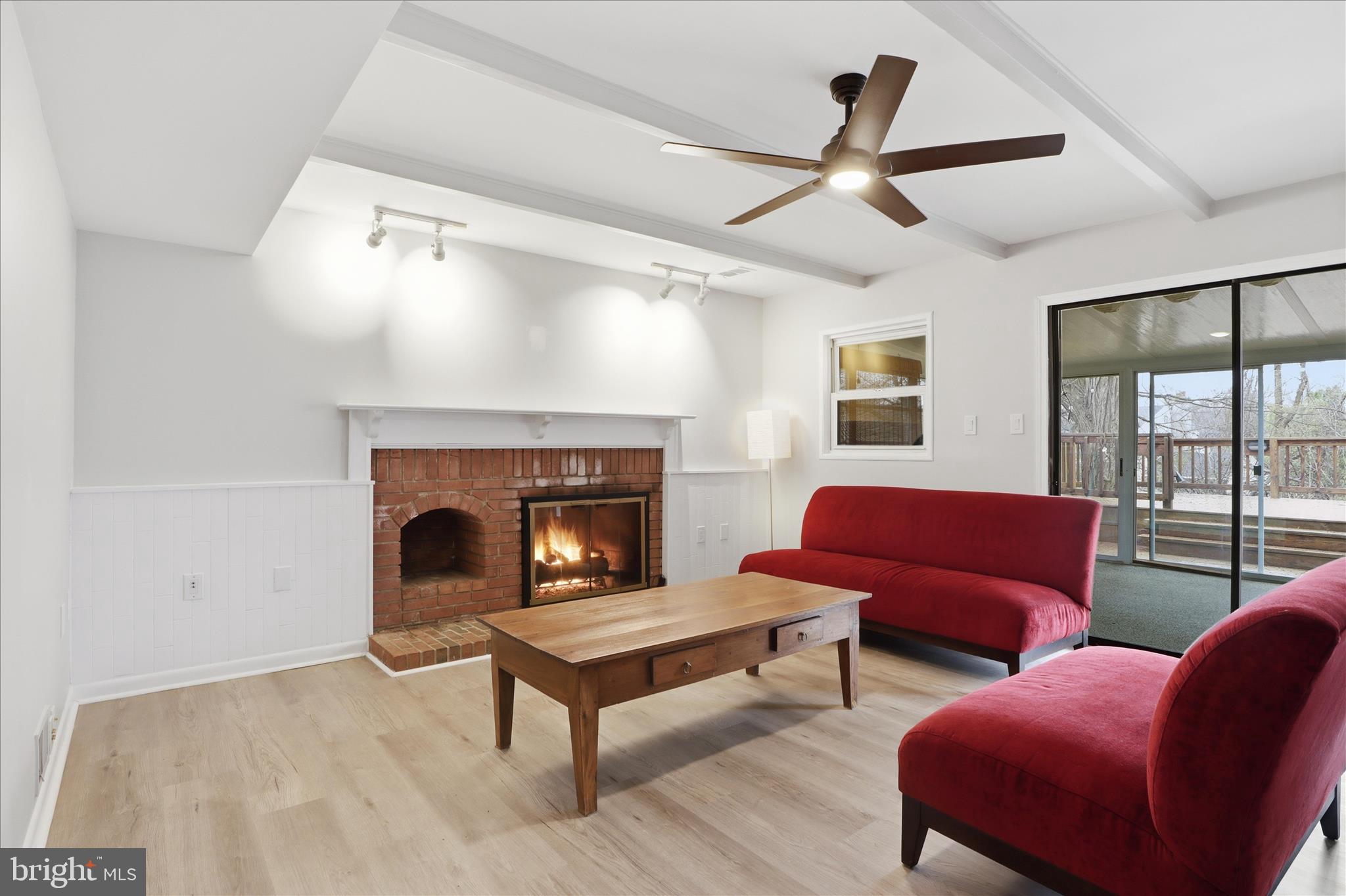 1600 Billman Lane Silver Spring, MD 20902 - Photo 25 of 41 a living room with furniture and a fireplace