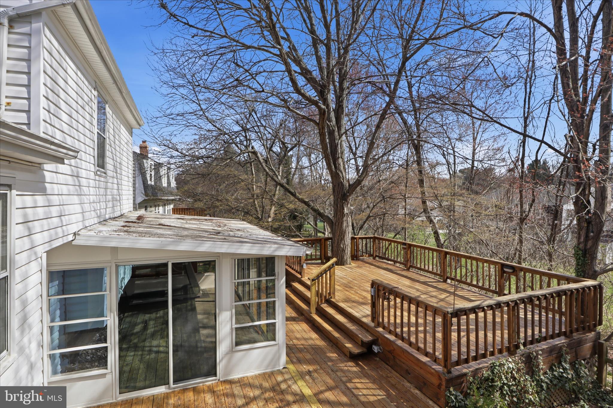 1600 Billman Lane Silver Spring, MD 20902 - Photo 30 of 41 a view of a house with a wooden deck