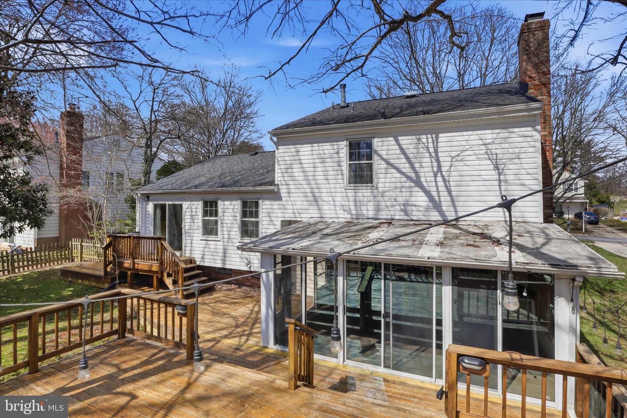 1600 Billman Lane Silver Spring, MD 20902 - Photo 33 of 41 a backyard of a house with yard table and chairs