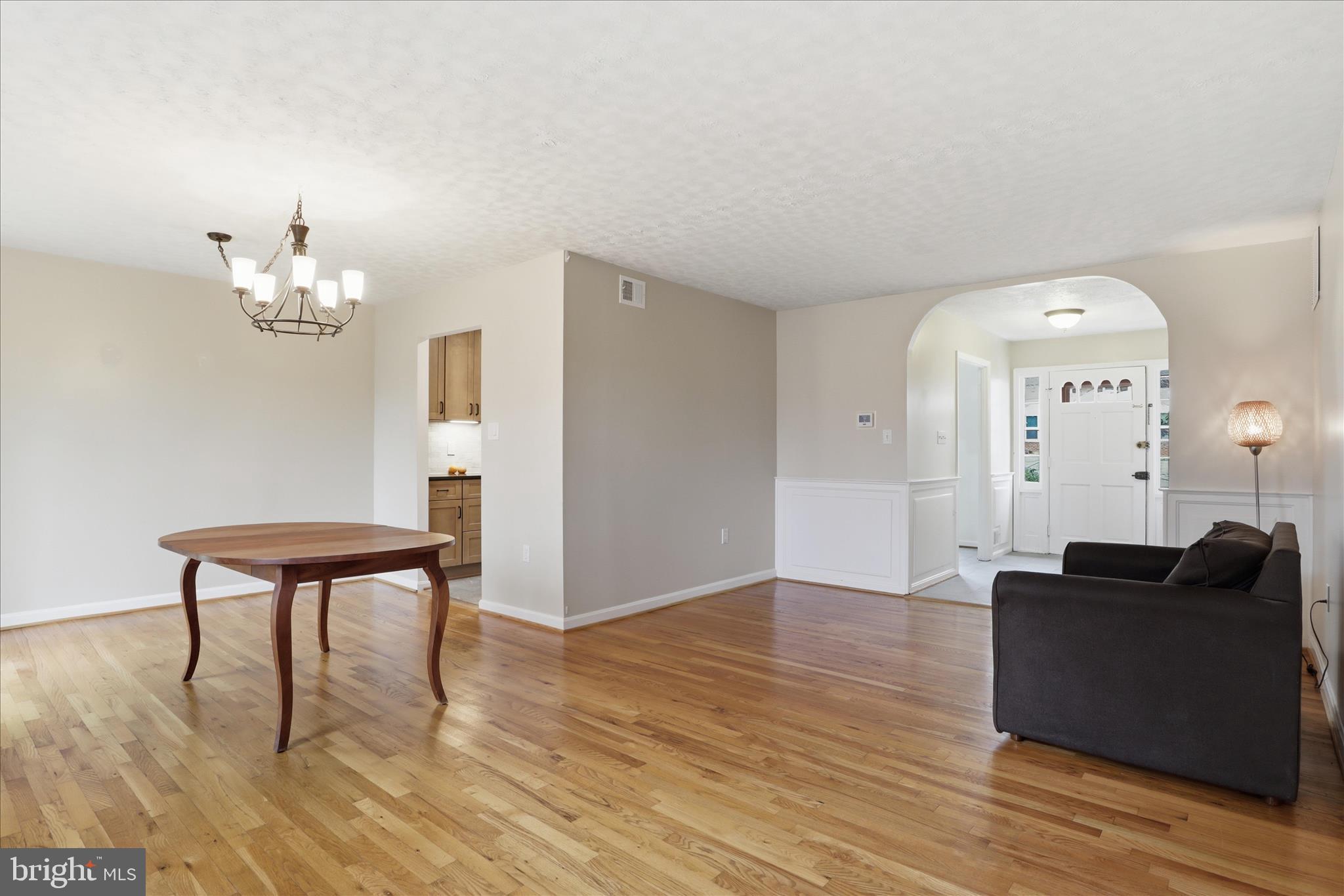 1600 Billman Lane Silver Spring, MD 20902 - Photo 6 of 41 a view of a livingroom with furniture and wooden floor