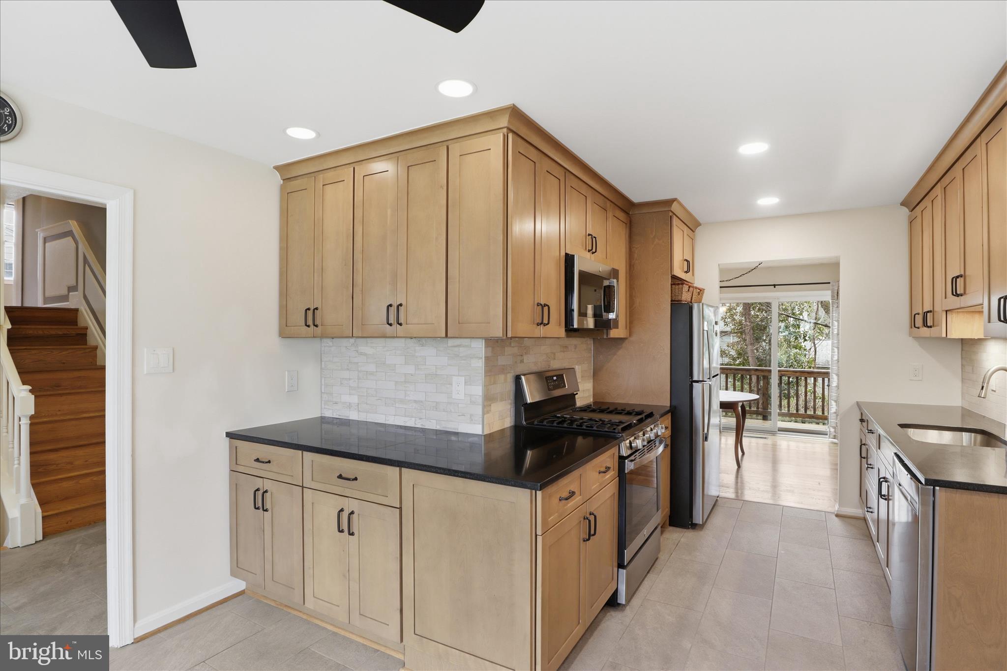 1600 Billman Lane Silver Spring, MD 20902 - Photo 10 of 41 a kitchen with a sink and cabinets