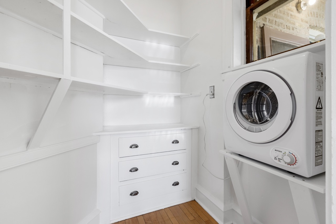 816 Mulford Street, Unit 2R Evanston, IL 60202 - Photo 13 of 13 a utility room with dryer and washer