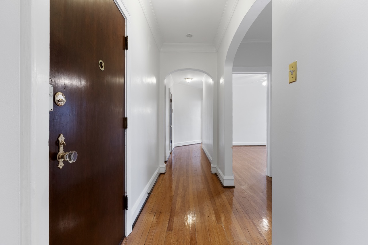 816 Mulford Street, Unit 2R Evanston, IL 60202 - Photo 9 of 13 a view of hallway with wooden floor