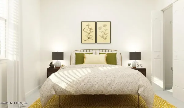 a kitchen with stainless steel appliances white cabinets and a refrigerator