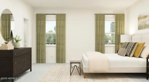 a bedroom with a bed and a potted plant