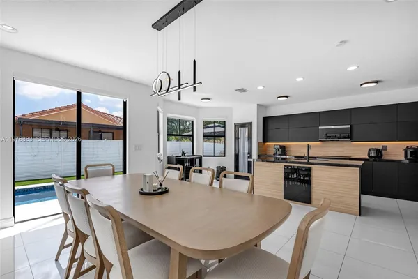 a kitchen with counter space cabinets and appliances