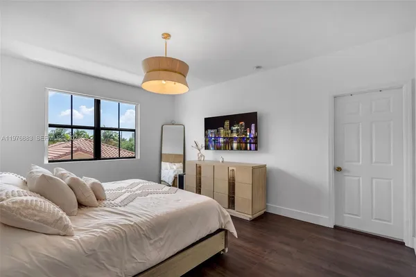 a view of a hallway with stairs