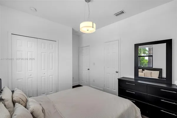 a close view of utility room with washer and dryer