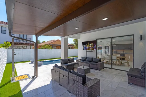 a bedroom with a bed and cabinets