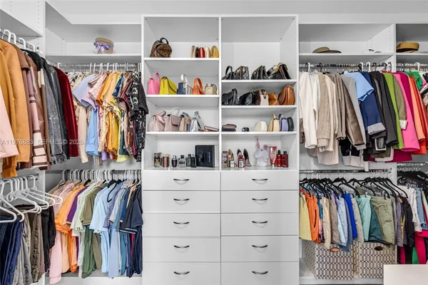 a front view of a house with yard and porch