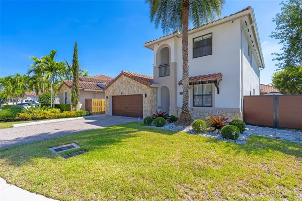 an aerial view of a city with lots of residential buildings