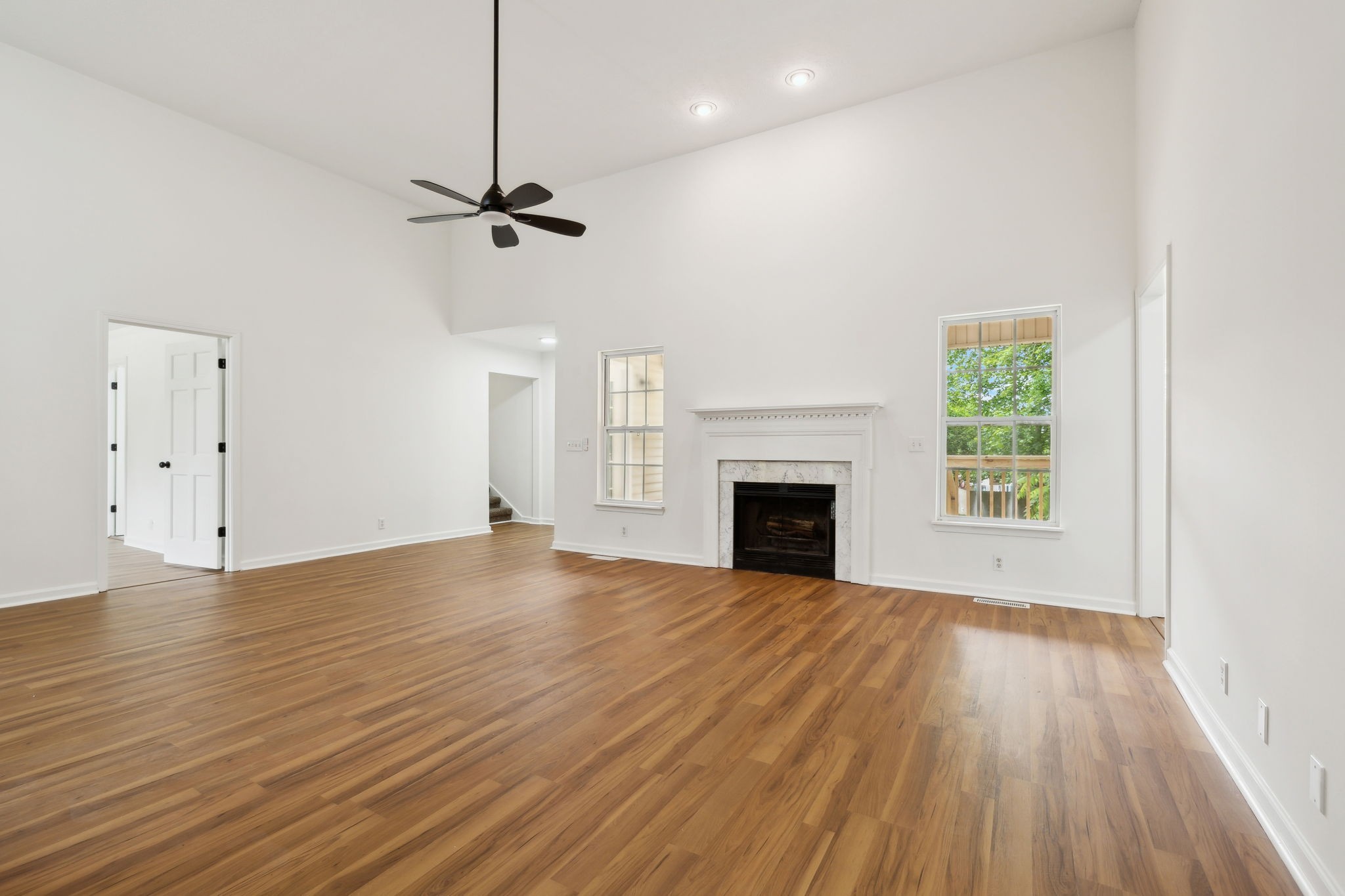 1075 Kathryn Road Mount Juliet, TN 37122 - Photo 4 of 27 a view of empty room with wooden floor and fan