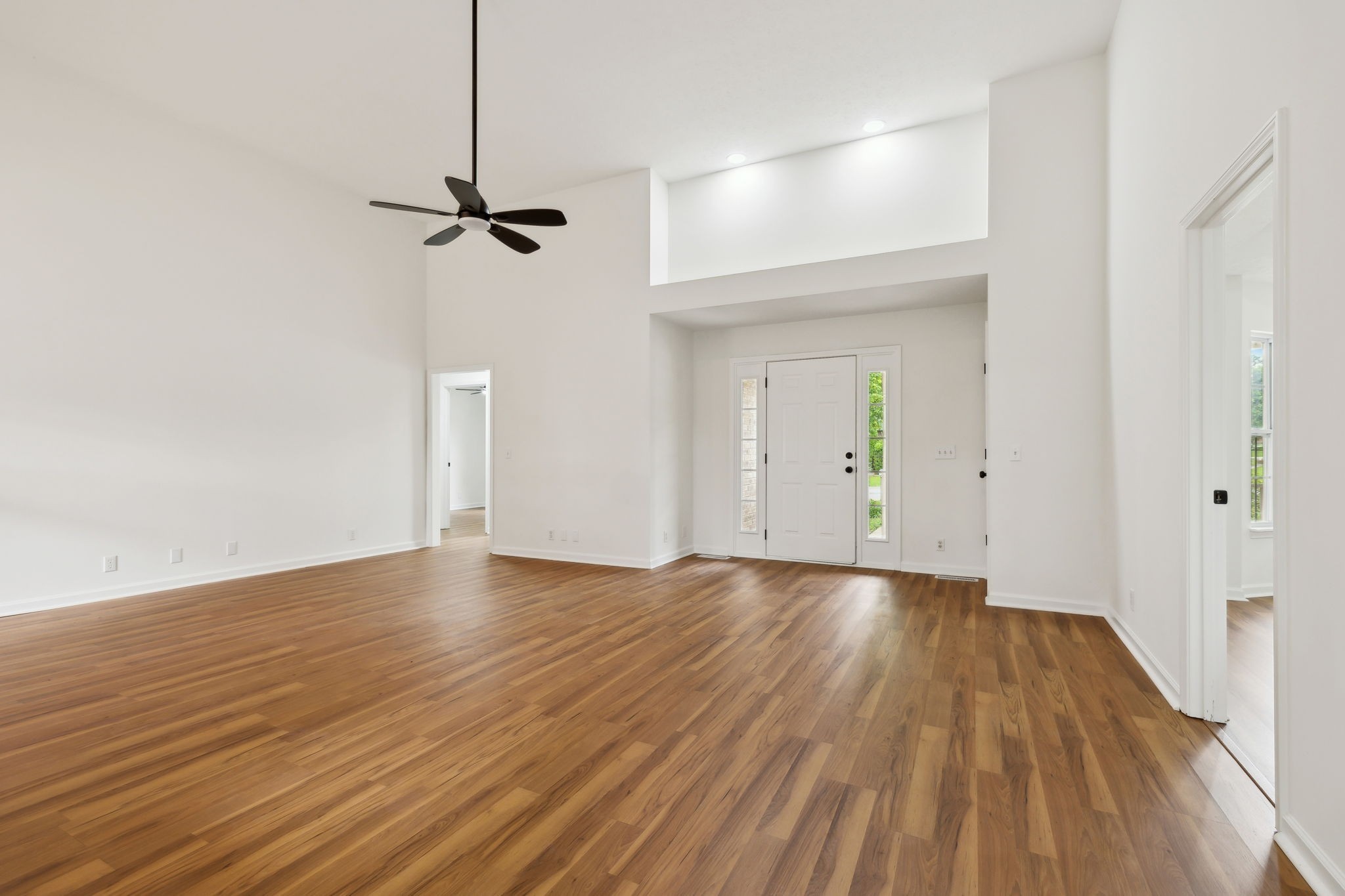 1075 Kathryn Road Mount Juliet, TN 37122 - Photo 6 of 27 a view of empty room with wooden floor and fan