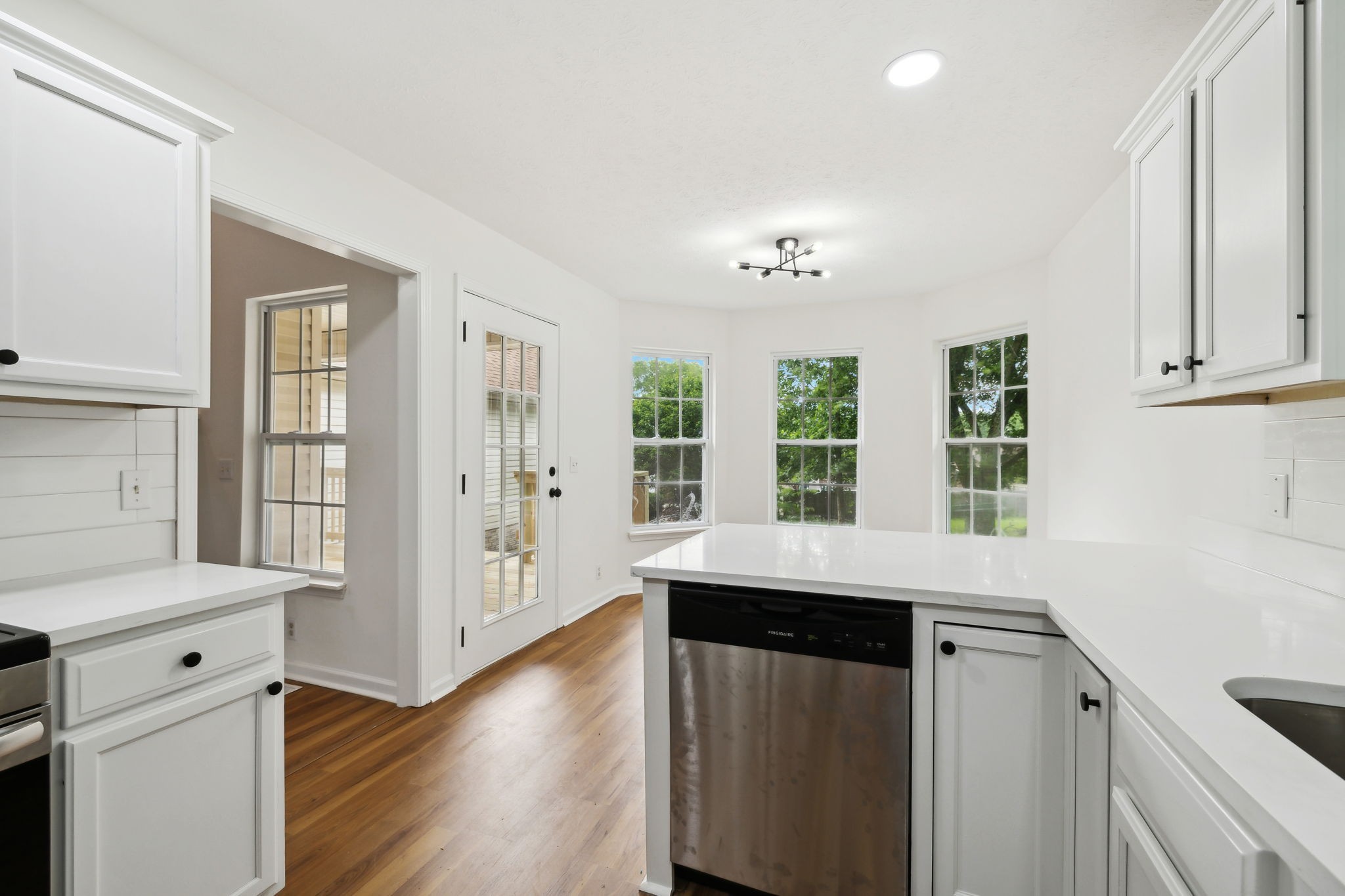 1075 Kathryn Road Mount Juliet, TN 37122 - Photo 10 of 27 a kitchen with a refrigerator and a sink