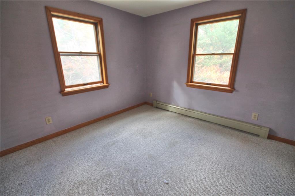 106-108 Ocean Point Road Boothbay Harbor, ME 04538 - Photo 14 of 18 The third bedroom with closet and...