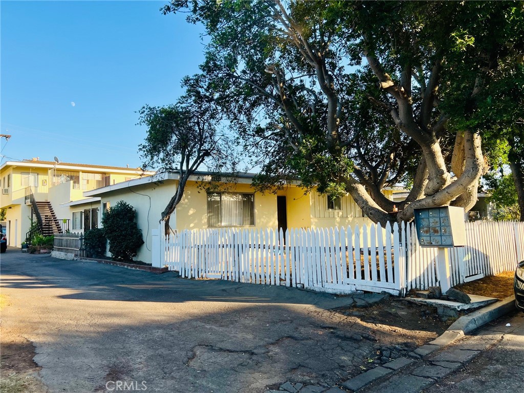12922 Shackelford Lane Garden Grove, CA 92841 - Photo 11 of 12 a backyard of a house with table and chairs