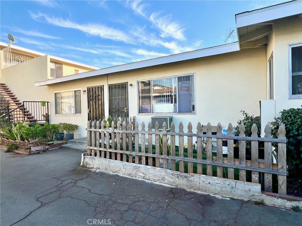 12922 Shackelford Lane Garden Grove, CA 92841 - Photo 12 of 12 a view of a house with a small yard