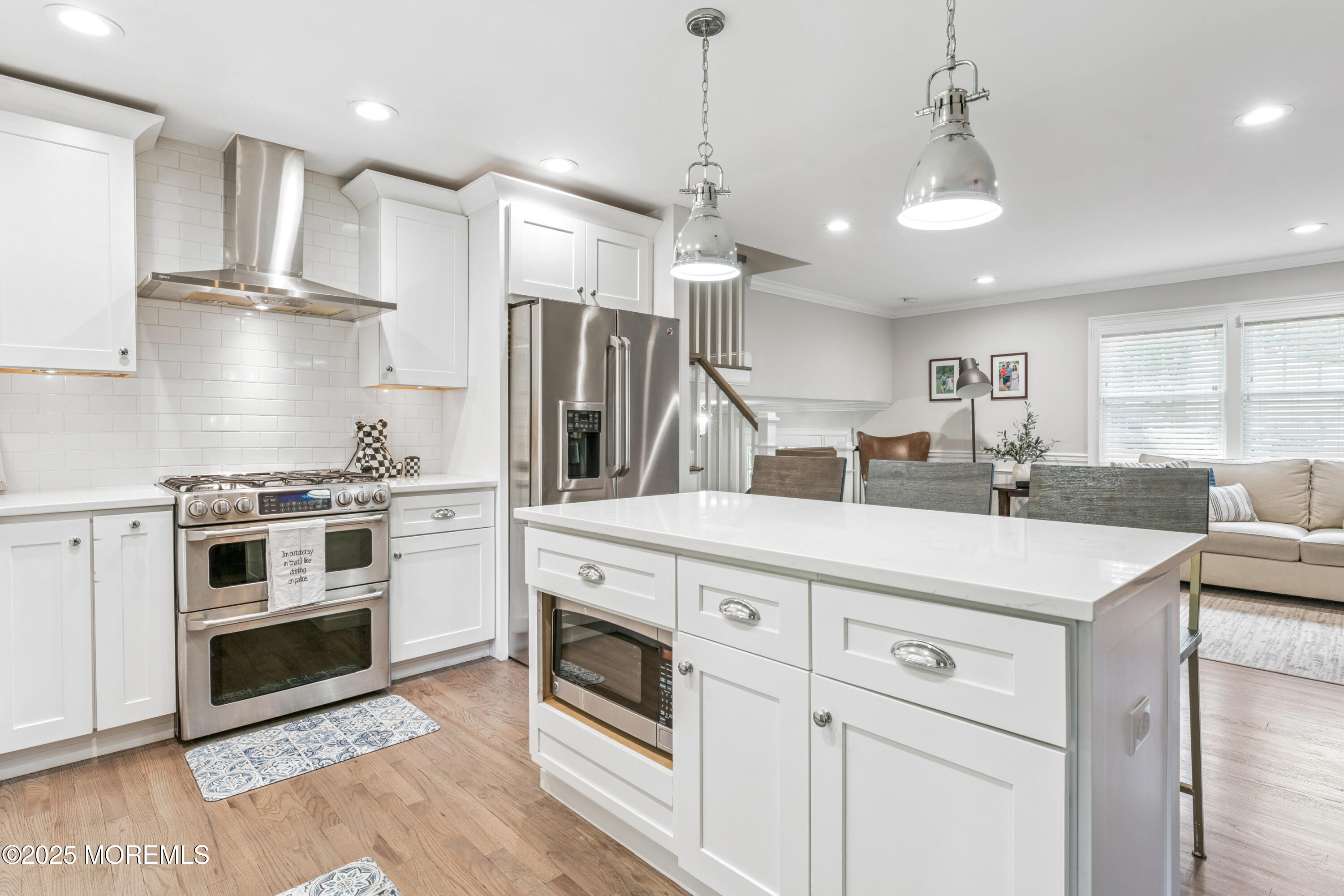 28 High Point Road Lincroft, NJ 07738 - Photo 14 of 42 a kitchen with stainless steel appliances granite countertop a sink and a refrigerator