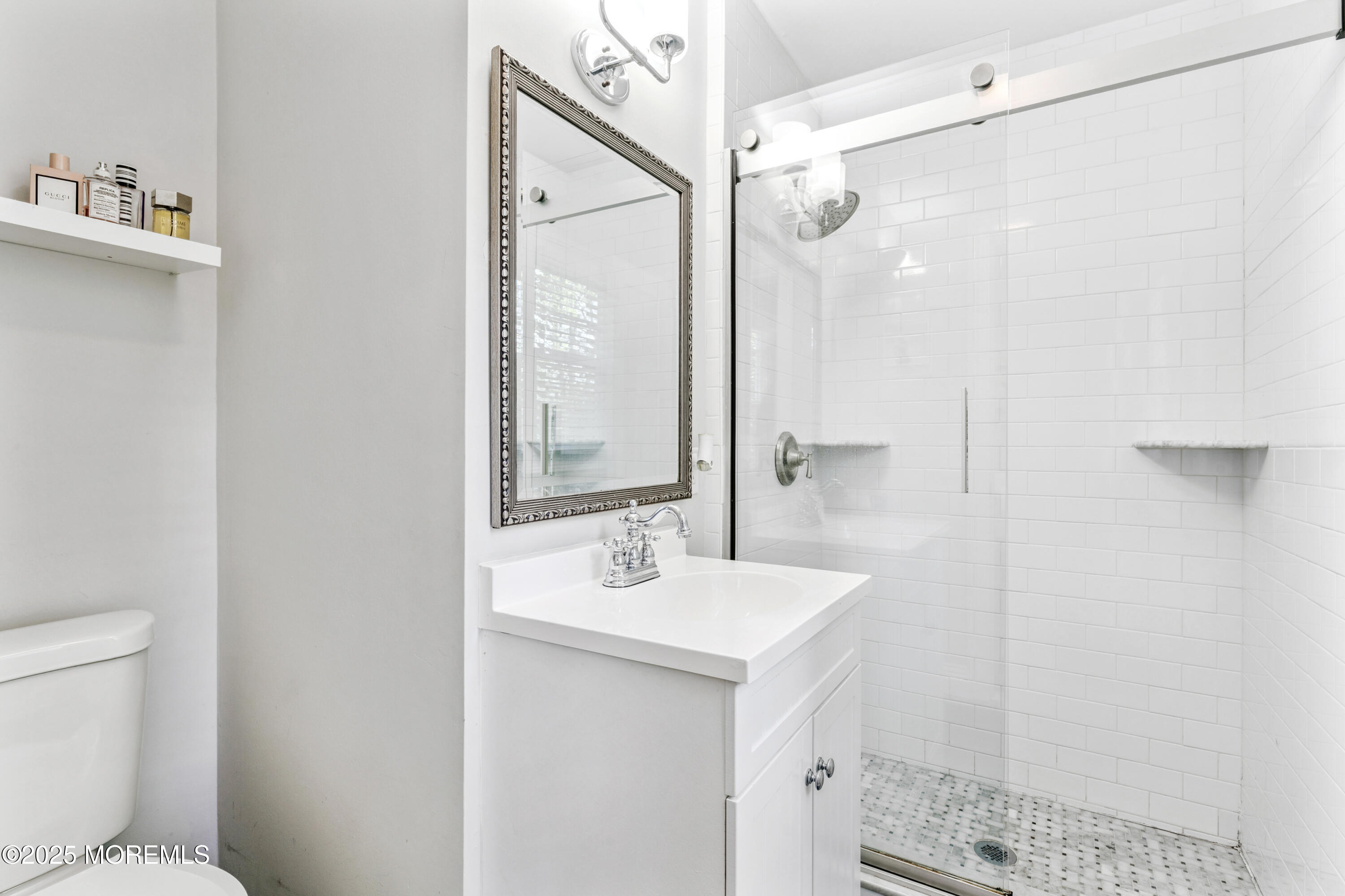 28 High Point Road Lincroft, NJ 07738 - Photo 23 of 42 a bathroom with a sink a toilet and shower